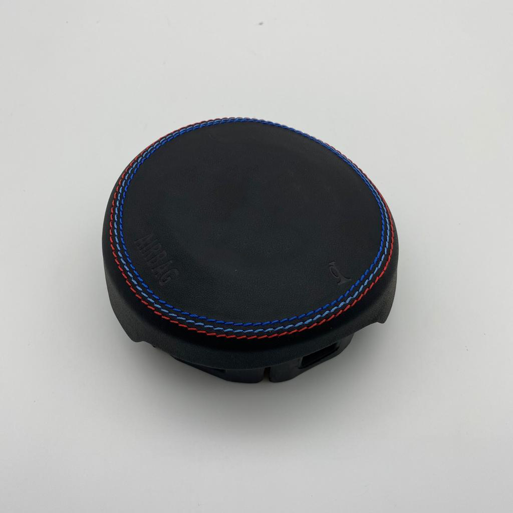 BMW custom airbag cover with tri-color stitching